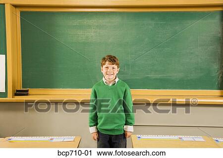 Portrait of boy in classroom View Large Photo Image Stock Image - Portrait of boy in classroom. Fotosearch