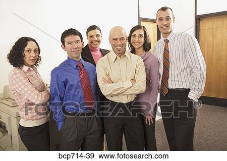 Portrait of co-workers in office View Large Photo Image Stock Photo - Portrait of co-workers in office. Fotosearch
