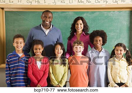 Portrait of teachers and students in classroom View Large Photo Image Stock Photo - Portrait of teachers and students in classroom. Fotosearch