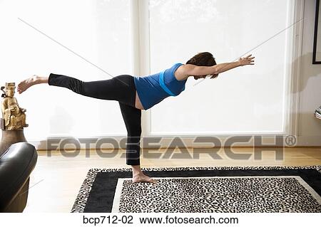 Pregnant woman practicing yoga View Large Photo Image Stock Image - Pregnant woman practicing yoga. Fotosearch