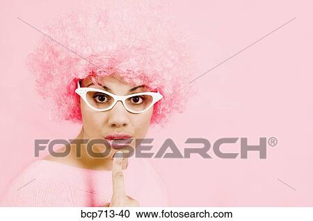 Woman wearing pink wig and eyeglasses View Large Photo Image Stock Image - Woman wearing pink wig and eyeglasses. Fotosearch