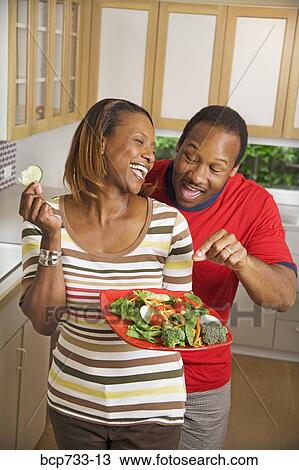 African couple with vegetable plate in kitchen View Large Photo Image Stock Image - African couple with vegetable plate in kitchen. Fotosearch