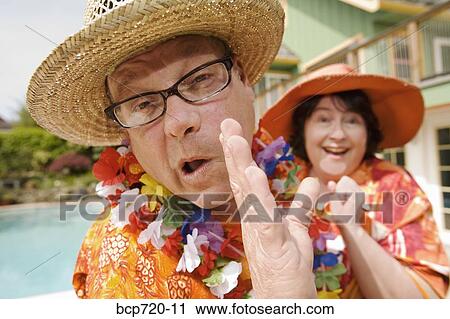 Couple in festive outfits View Large Photo Image Stock Image - Couple in festive outfits. Fotosearch