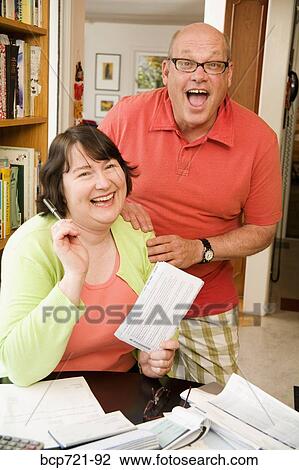 Couple paying bills View Large Photo Image Stock Image - Couple paying bills. Fotosearch