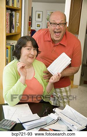Couple paying bills View Large Photo Image Stock Image - Couple paying bills. Fotosearch