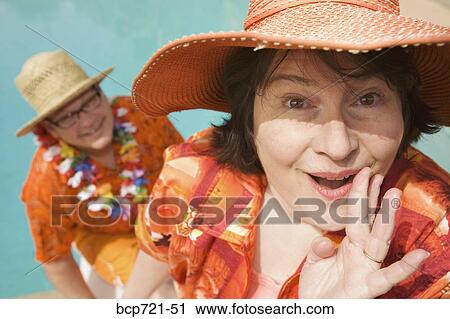 Couple wearing festive outfits View Large Photo Image Stock Image - Couple wearing festive outfits. Fotosearch
