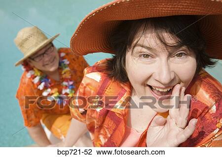 Couple wearing festive outfits View Large Photo Image Stock Image - Couple wearing festive outfits. Fotosearch
