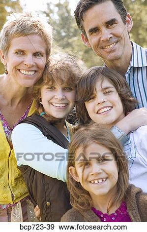 Family posing outside View Large Photo Image Stock Photo - Family posing outside. Fotosearch