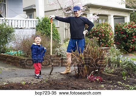 Father and son gardening View Large Photo Image Stock Photography - Father and son gardening. Fotosearch