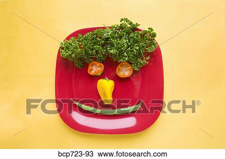 Food arranged into a smiley face on plate View Large Photo Image Stock Image - Food arranged into a smiley face on plate. Fotosearch