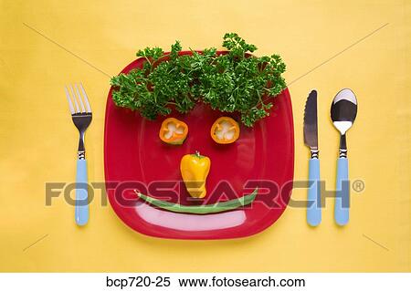 Food arranged into a smiley face on plate View Large Photo Image Stock Photography - Food arranged into a smiley face on plate. Fotosearch