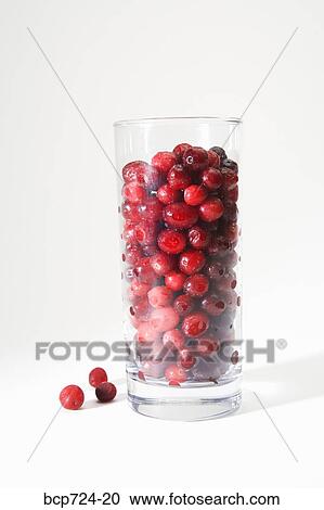 Glass of cranberries View Large Photo Image Stock Image - Glass of cranberries. Fotosearch