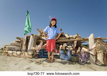 Group of children in beach fort View Large Photo Image Stock Photo - Group of children in beach fort. Fotosearch