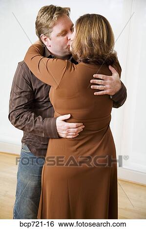 Kissing couple dancing View Large Photo Image Stock Photograph - Kissing couple dancing. Fotosearch
