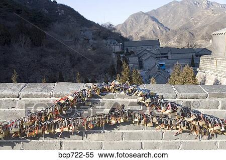 Locks strung on The Great Wall, China View Large Photo Image Stock Photography - Locks strung on The Great Wall, China. Fotosearch