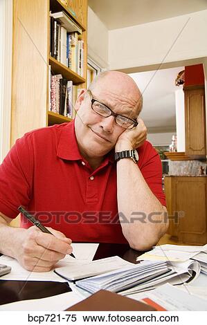 Man paying bills View Large Photo Image Stock Photography - Man paying bills. Fotosearch