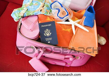Packed suitcase View Large Photo Image Stock Photo - Packed suitcase. Fotosearch