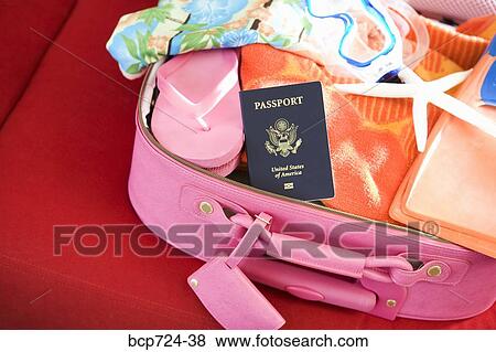 Stock Photo - Packed suitcase. Fotosearch