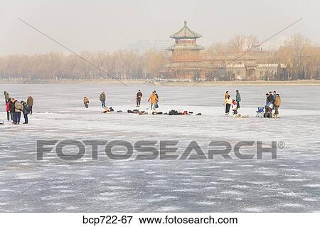 People walking on icy lake, Beijing, China View Large Photo Image Stock Photo - People walking on icy lake, Beijing, China. Fotosearch