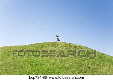 Person in wheelchair on top of hill View Large Photo Image Stock Photography - Person in wheelchair on top of hill. Fotosearch