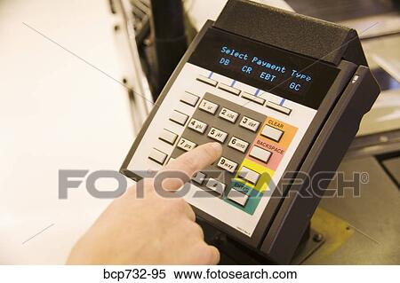 Person using debit card transaction machine View Large Photo Image Stock Photography - Person using debit card transaction machine. Fotosearch