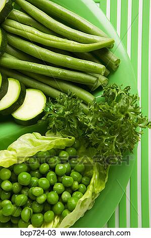 Plate of green vegetables View Large Photo Image Stock Image - Plate of green vegetables. Fotosearch