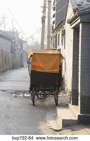 Rickshaw in alley, Beijing, Hutong, China View Large Photo Image Picture - Rickshaw in alley, Beijing, Hutong, China. Fotosearch