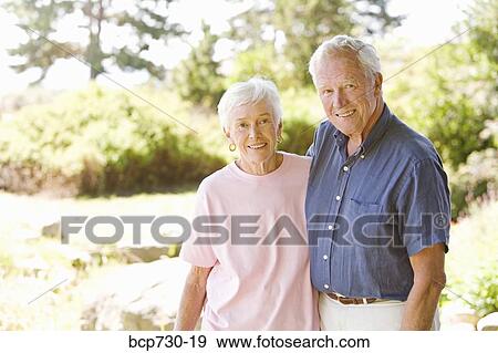 Stock Photo - Senior couple hugging. Fotosearch