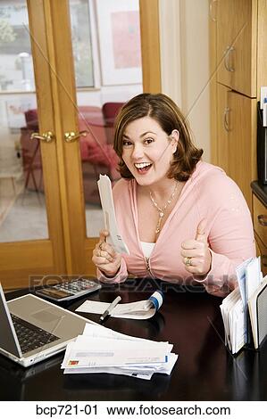 Woman paying bills View Large Photo Image Stock Image - Woman paying bills. Fotosearch