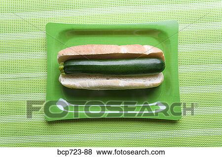 Zucchini in hot dog bun View Large Photo Image Stock Photo - Zucchini in hot dog bun. Fotosearch