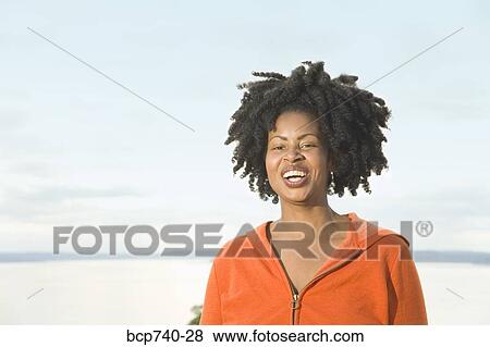 Stock Photo - African woman with dreadlocks. Fotosearch