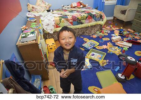 Asian boy in messy bedroom View Large Photo Image Stock Image - Asian boy in messy bedroom. Fotosearch