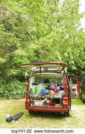 Camper van parked with doors open View Large Photo Image Stock Image - Camper van parked with doors open. Fotosearch