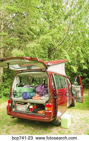 Camper van parked with doors open View Large Photo Image Stock Image - Camper van parked with doors open. Fotosearch