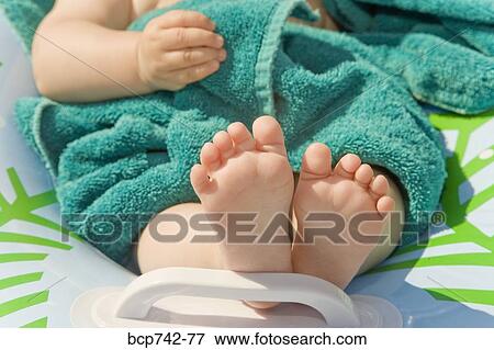 Close up of baby’s bare feet View Large Photo Image Stock Photo - Close up of baby’s bare feet. Fotosearch
