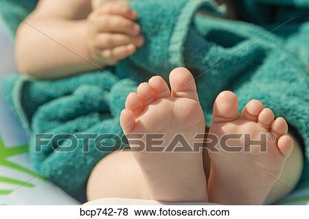 Close up of baby’s bare feet View Large Photo Image Stock Photo - Close up of baby’s bare feet. Fotosearch