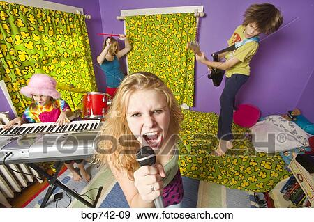 Kids playing instruments in band View Large Photo Image Stock Photo - Kids playing instruments in band. Fotosearch