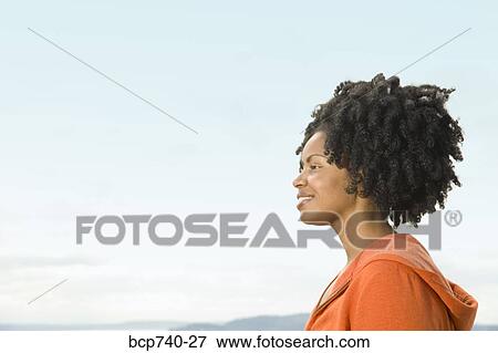 Profile of African woman with dreadlocks View Large Photo Image Stock Photo - Profile of African woman with dreadlocks. Fotosearch