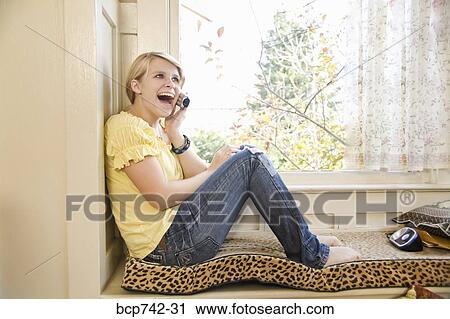 Teenaged girl taking on cell phone View Large Photo Image Stock Image - Teenaged girl taking on cell phone. Fotosearch