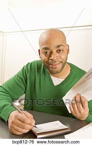 African man writing check View Large Photo Image Stock Photograph - African man writing check. Fotosearch