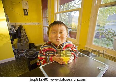 Asian boy drinking water View Large Photo Image Stock Image - Asian boy drinking water. Fotosearch