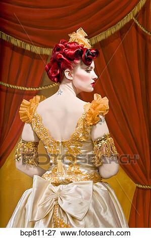 Rear view of woman wearing ornate costume View Large Photo Image Stock Photo - Rear view of woman wearing ornate costume. Fotosearch
