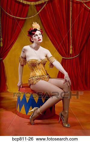Woman wearing strapless circus costume View Large Photo Image Stock Photograph - Woman wearing strapless circus costume. Fotosearch