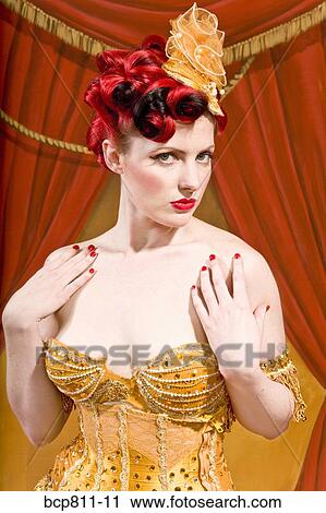 Woman wearing strapless ornate costume View Large Photo Image Stock Image - Woman wearing strapless ornate costume. Fotosearch