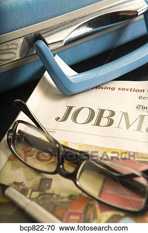 Briefcase, eyeglasses and employment section of newspaper View Large Photo Image Stock Image - Briefcase, eyeglasses and employment section of newspaper. Fotosearch