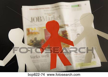Paper dolls and employment section of newspaper View Large Photo Image Picture - Paper dolls and employment section of newspaper. Fotosearch