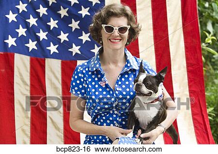 Patriotic woman and Boston Terrier dog posing with American flag View Large Photo Image Stock Photograph - Patriotic woman and Boston Terrier dog posing with American flag. Fotosearch