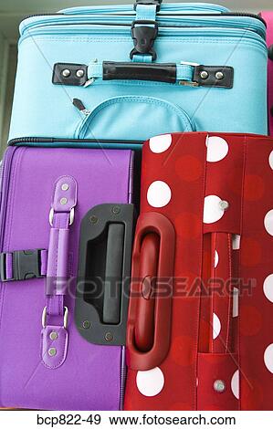 Three colorful suitcases View Large Photo Image Stock Photo - Three colorful suitcases. Fotosearch