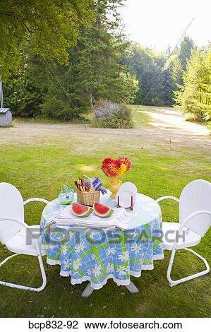Breakfast table in a garden View Large Photo Image Stock Image - Breakfast table in a garden. Fotosearch