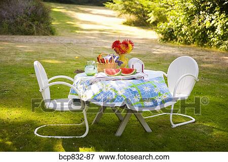 Breakfast table in a garden View Large Photo Image Stock Photo - Breakfast table in a garden. Fotosearch